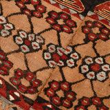 Kilim anatolien ancien tons rouges et beiges, motifs tribaux colorés