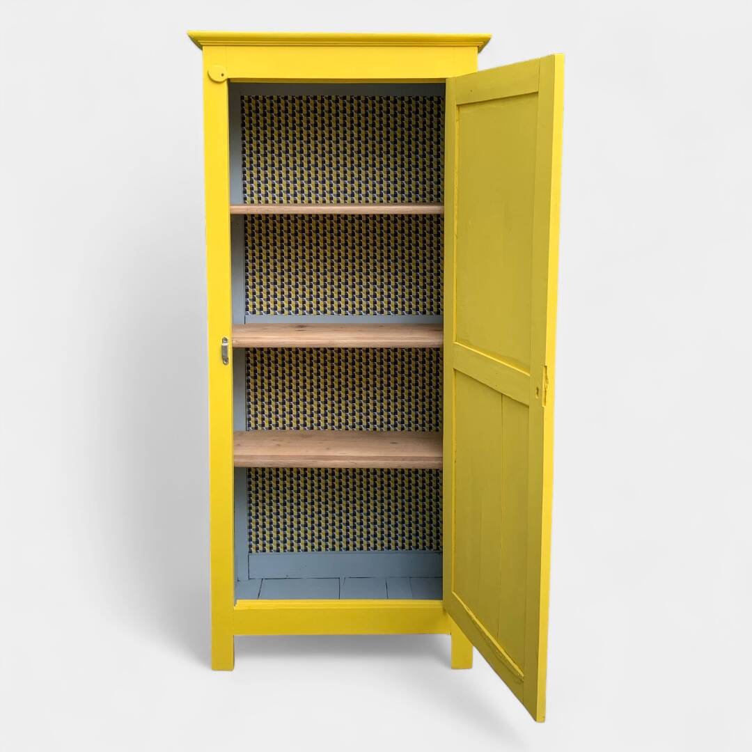 Antique powder yellow Parisian bonnetière wardrobe.