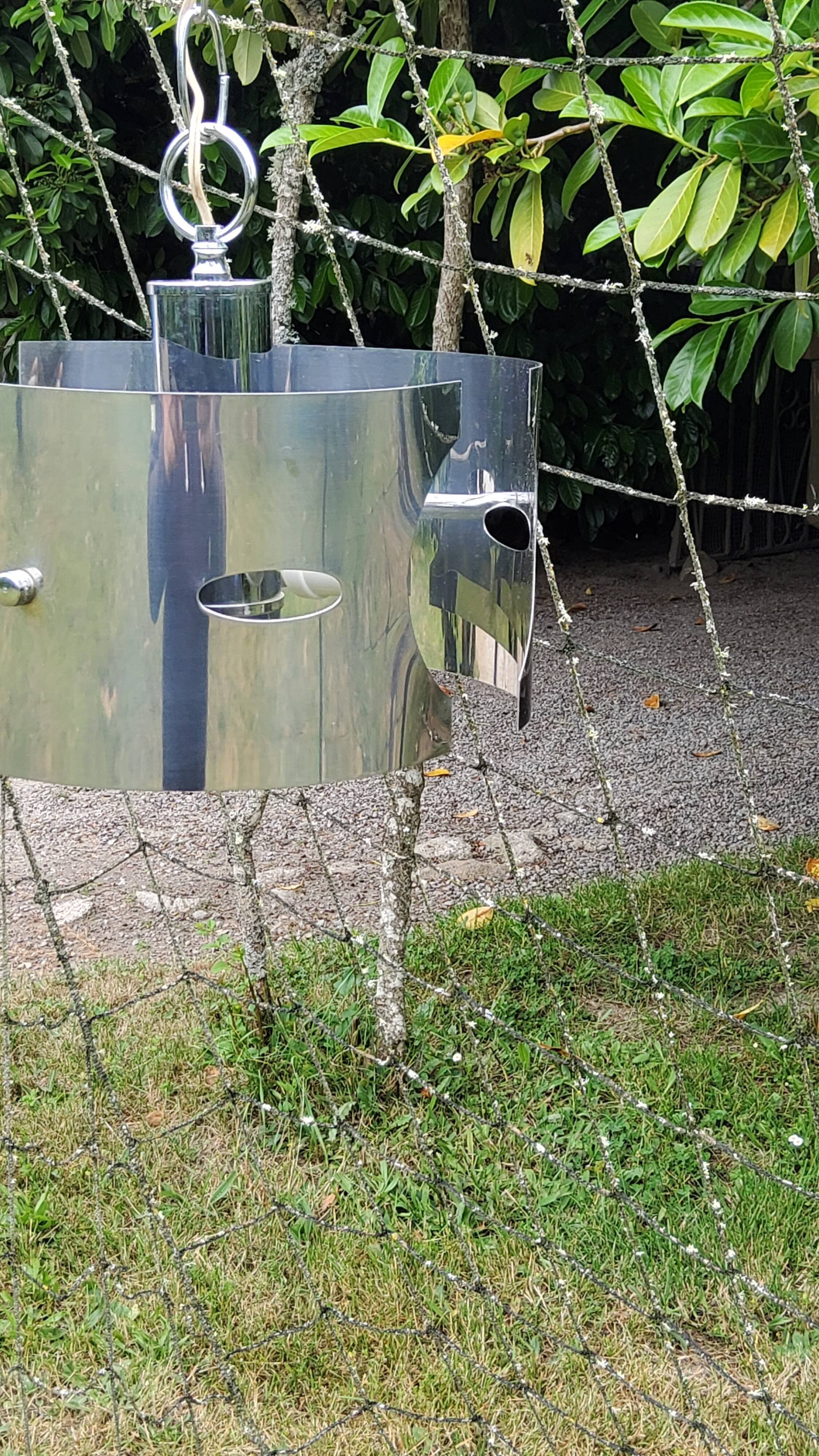 Design chandelier of the 70s in chromed metal