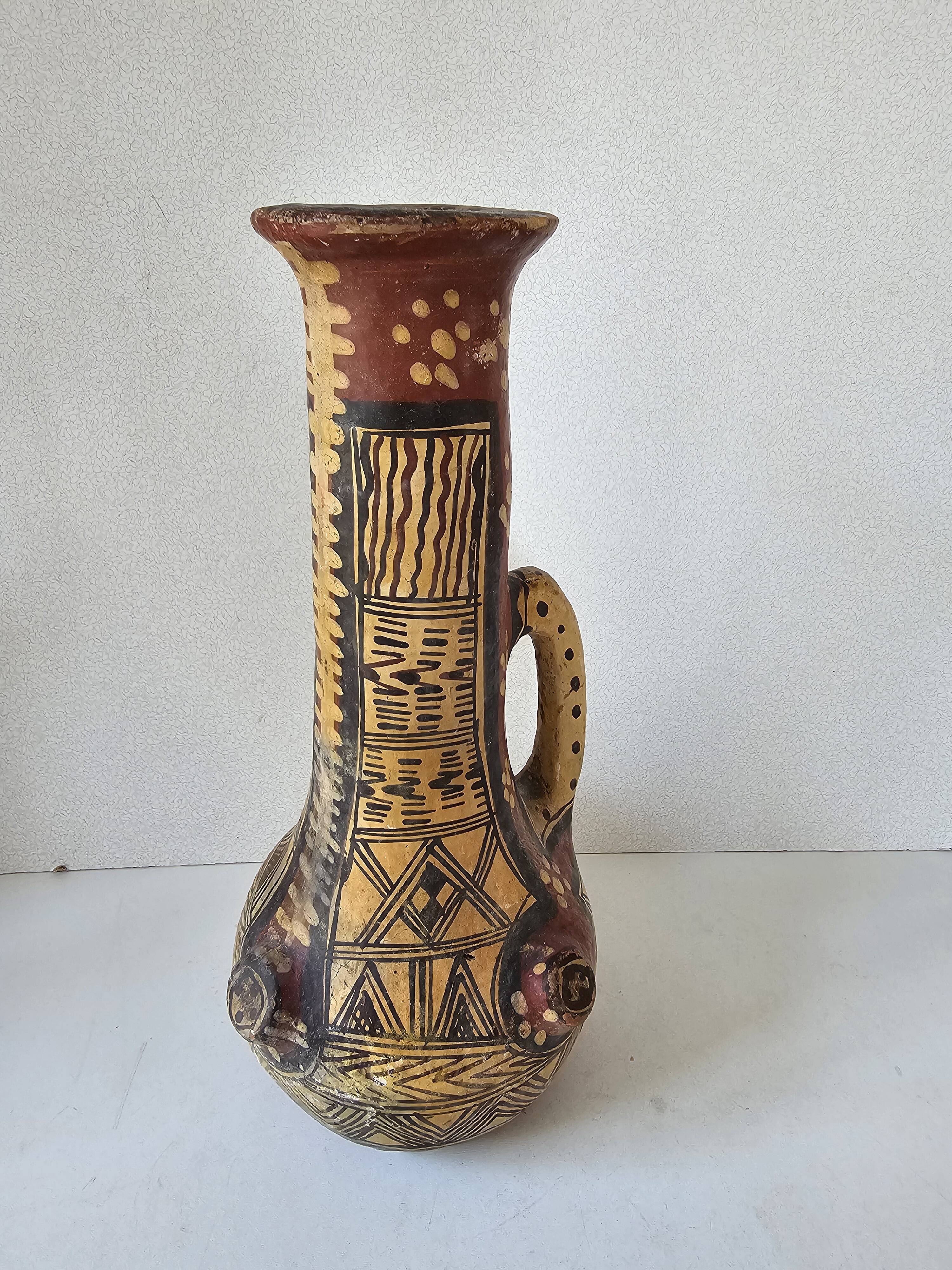 Antique Kabyle Algerian pottery vase with handle and polychrome geometric decorations