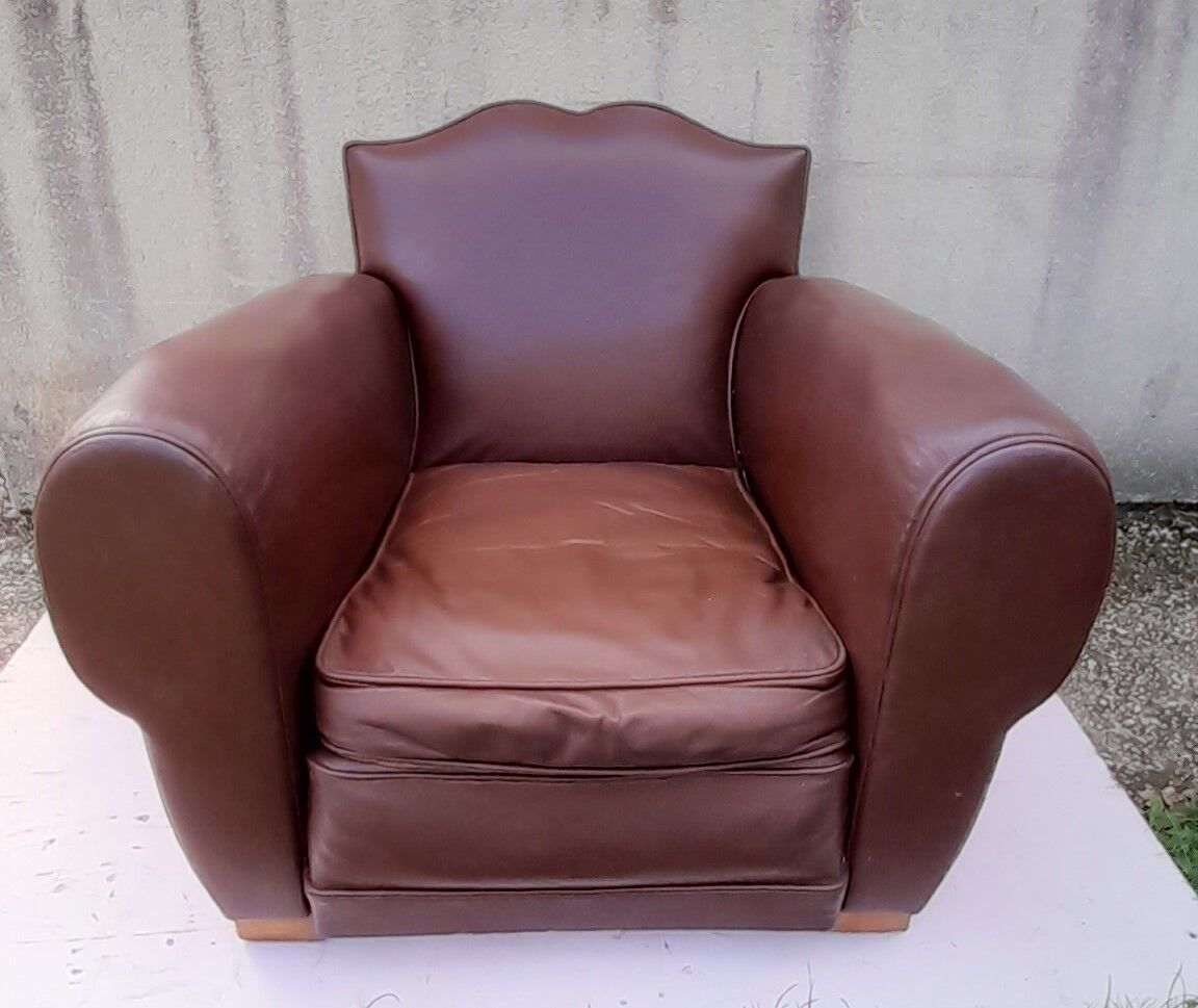 Club armchair in brown skai back mustache