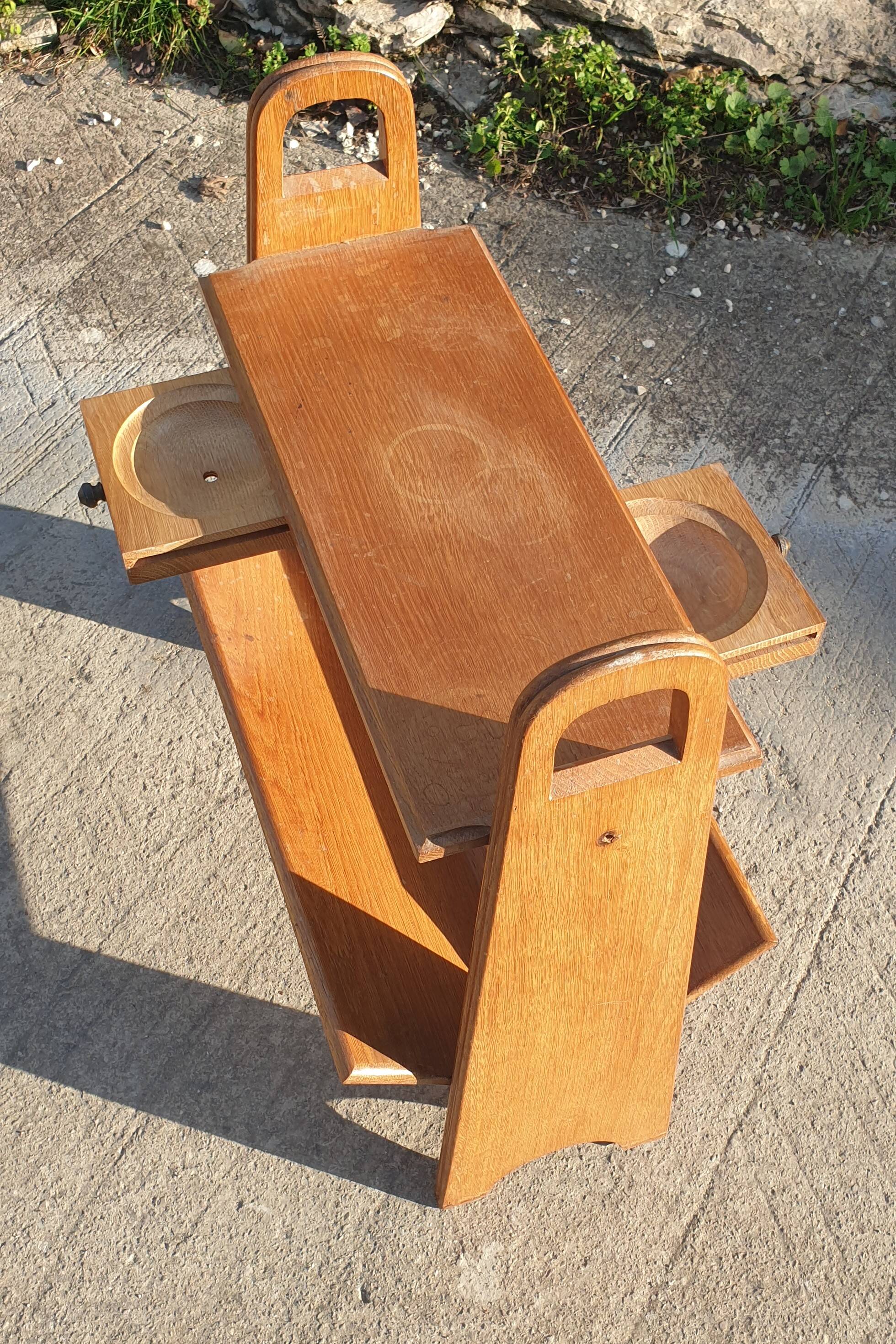 Magazine rack with sliding drawers in light wood, Scandinavian style.