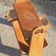 Magazine rack with sliding drawers in light wood, Scandinavian style.