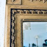 Gilded and beveled pier mirror 88x58cm