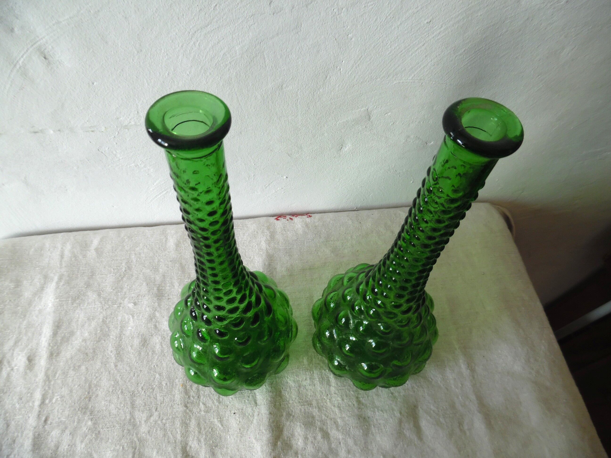 Two Italian bubble glass bottles