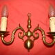 Pair of bronze wall lights with 2 arms in "Dutch" style.