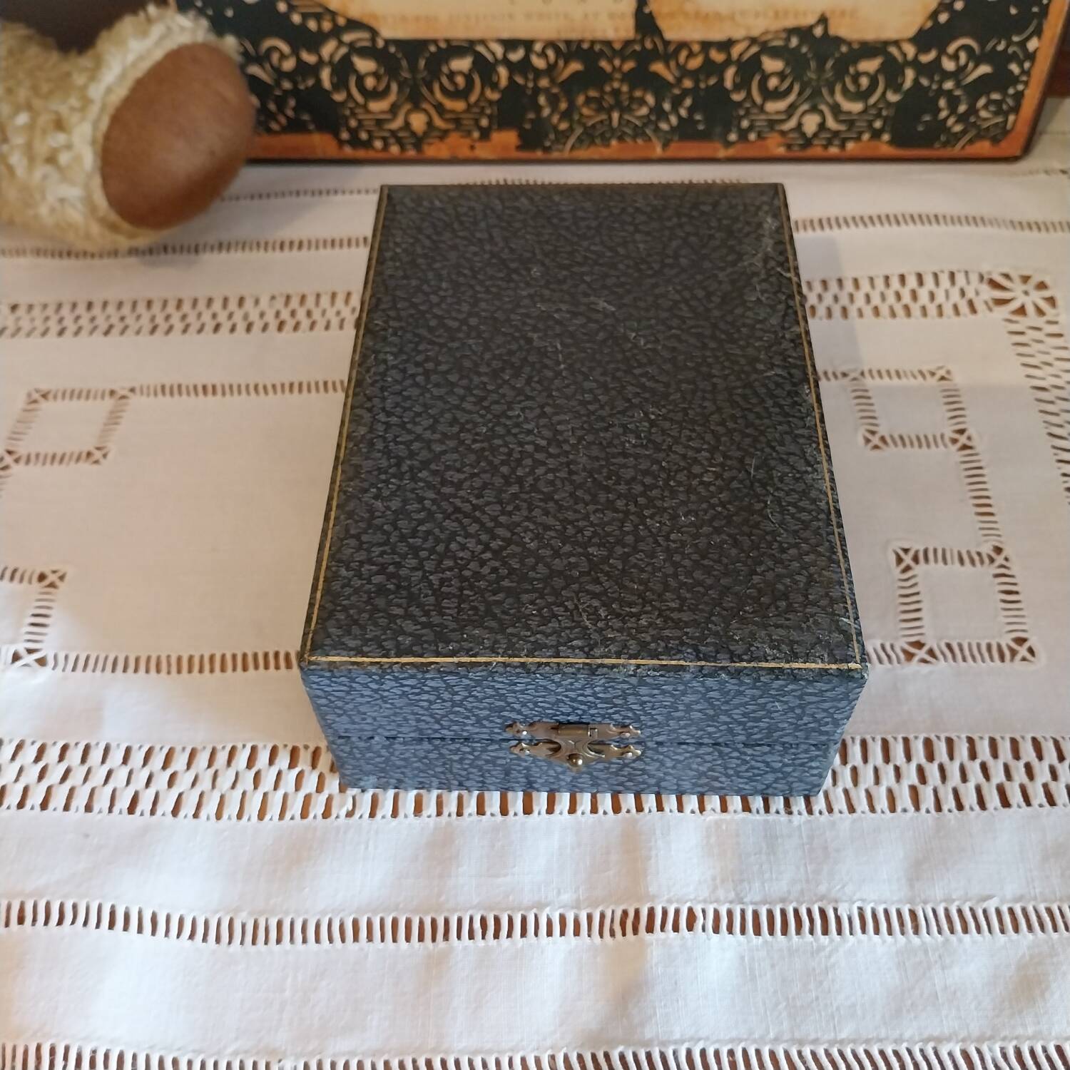 Egg cup and spoon in silver metal