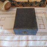 Egg cup and spoon in silver metal