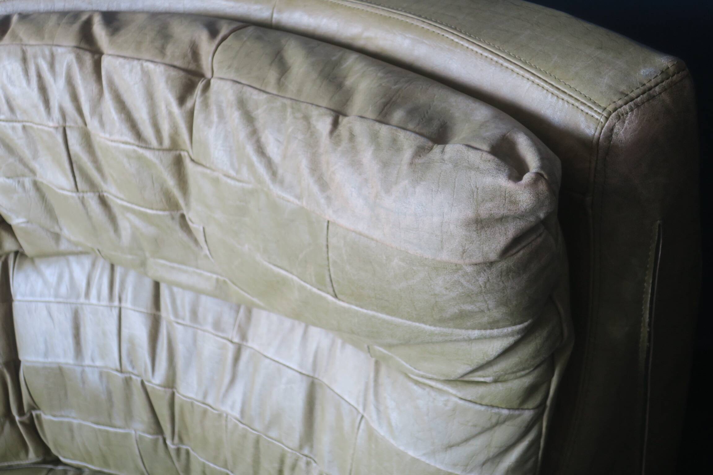 Patchwork large olive green leather corner lounge chair by Laauser, 1970s