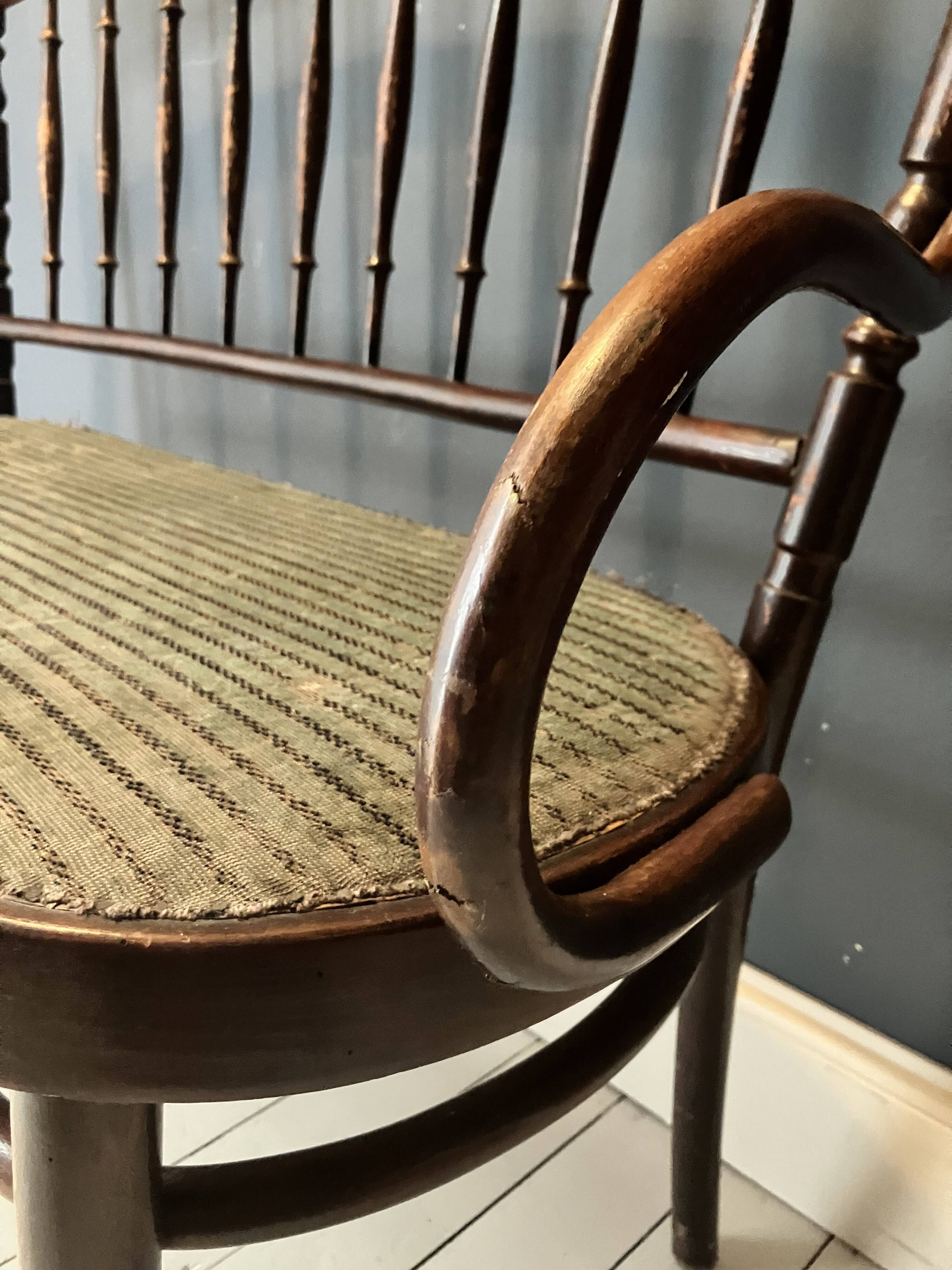 Thonet-branded bistro-style bench in turned wood, velvet and caning