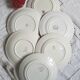 Flat earthenware plates with gilded edges