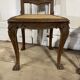 Paire de chaises cannée pieds pattes de lion