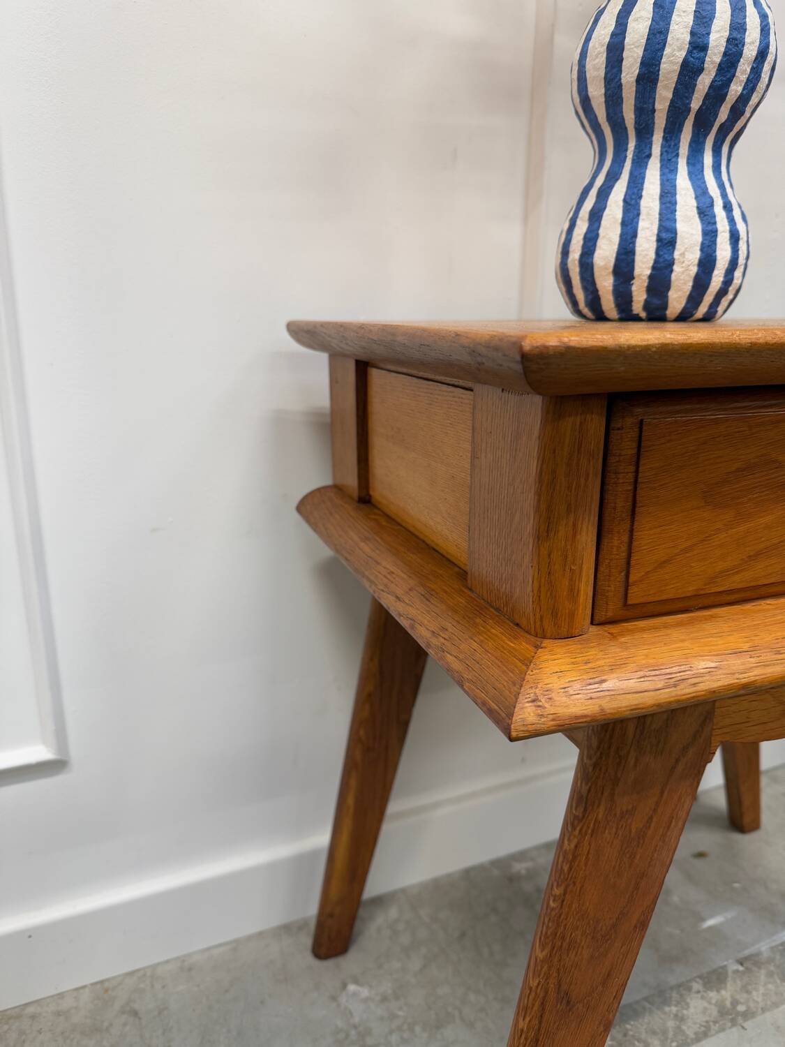 Bedside table with compass feet