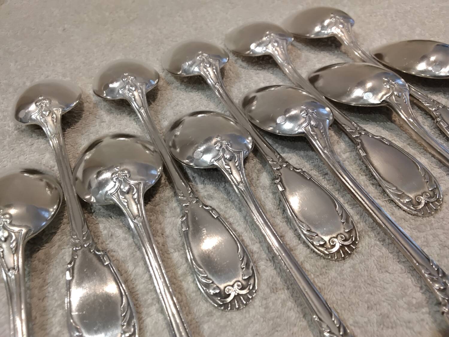 11 silver-plated dessert spoons, OD style, Louis XVI style