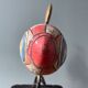 Old painted sheet metal pendulum toy