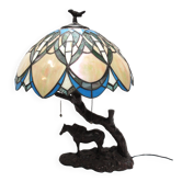 Tiffany-style stained glass table lamp, floral pattern, The pony and the child.
