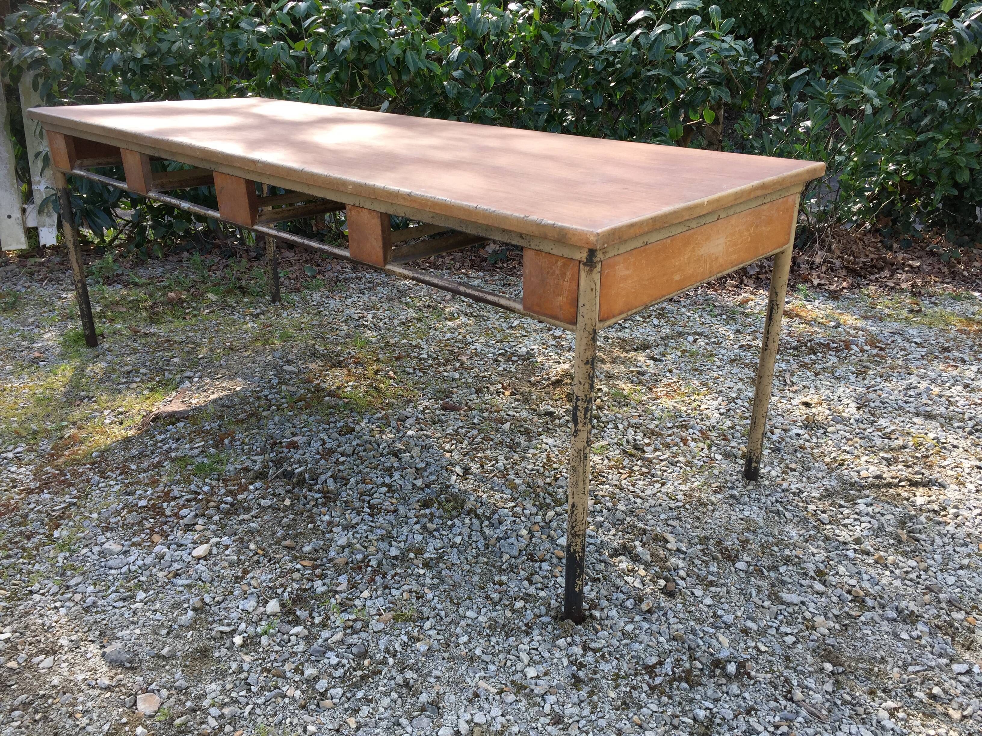 Vintage modernist table with metal tubular base