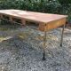 Vintage modernist table with metal tubular base
