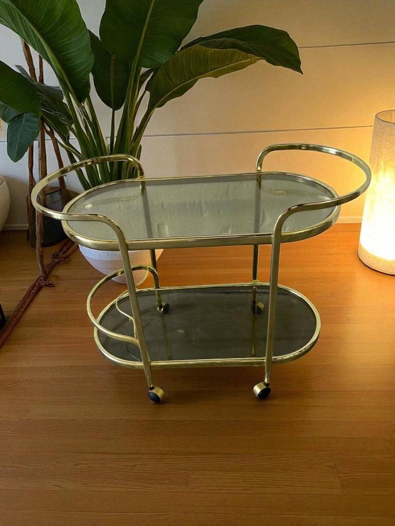 Vintage gold bar cart / side table with smoked glass