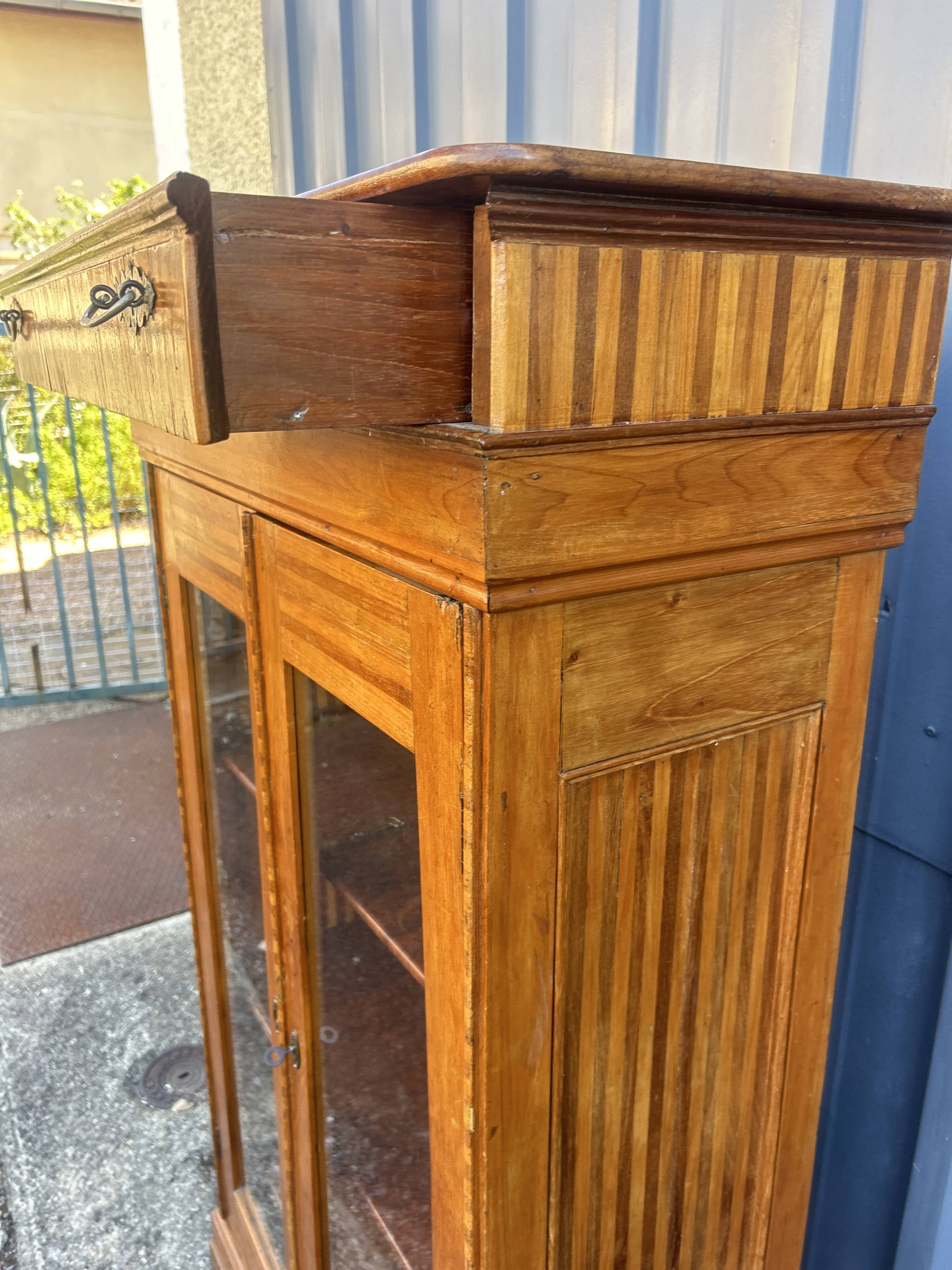 Two-door mahogany display cabinet