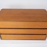 Wall mounted cabinet in teak of danish design from the 1960s.