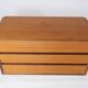 Wall mounted cabinet in teak of danish design from the 1960s.