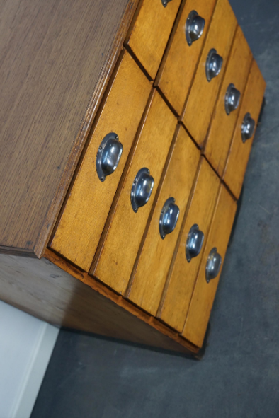 Apothecary cabinet or bank of drawers in oak and German pine mid-twentieth century