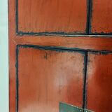 Red Chinese cabinet with three doors