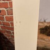 Laminated photograph.