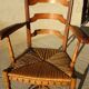 old armchair with leather armrests, from the 19th century