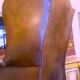 Wingback armchair in dark brown patinated leather, 1970s