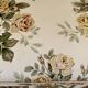 Napoleon III floral toad sofa with boudoir spirit and sliced backrest.