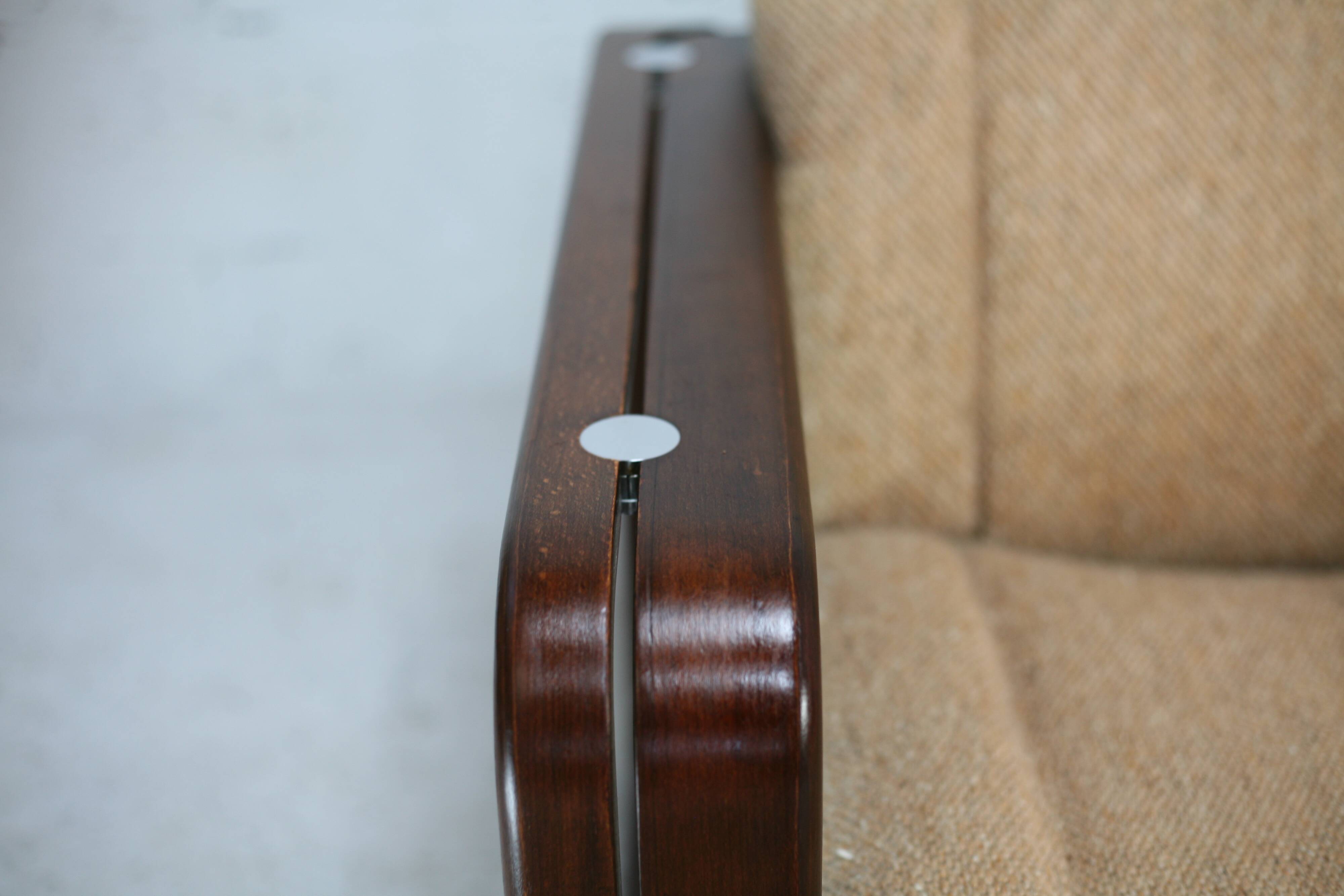 Modernist armchair. Wool, wood and steel. Circa 1970
