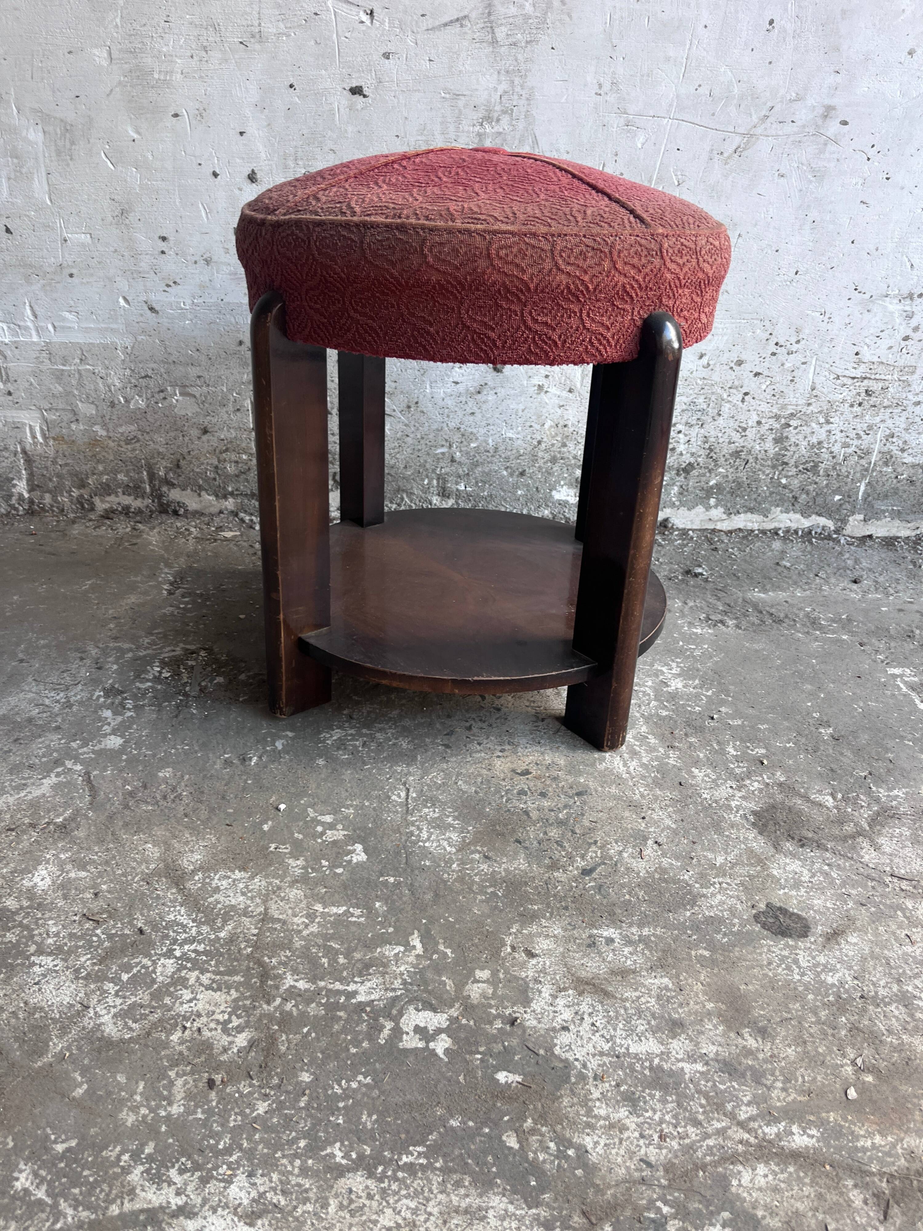 Art Deco stool upholstered with a lower shelf, France, circa 1930.