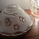 Moulded glass lampshade with floral decoration, granite texture.