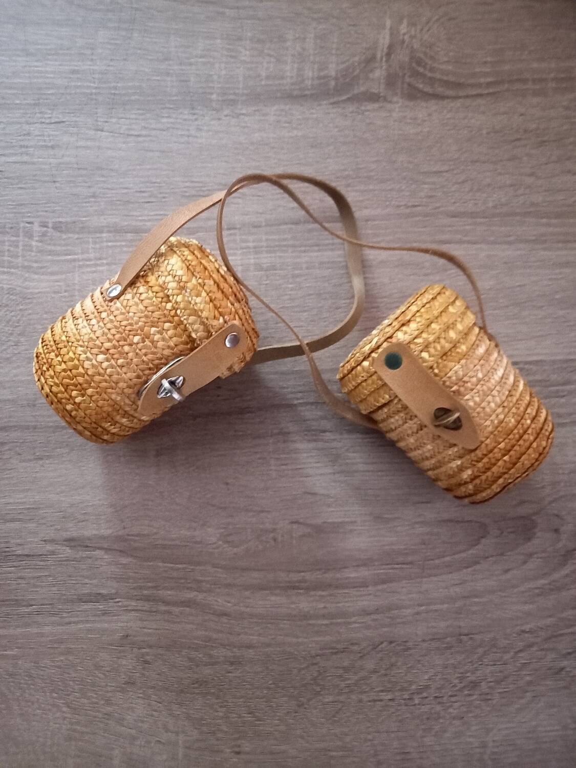 2 small rattan and leather baskets