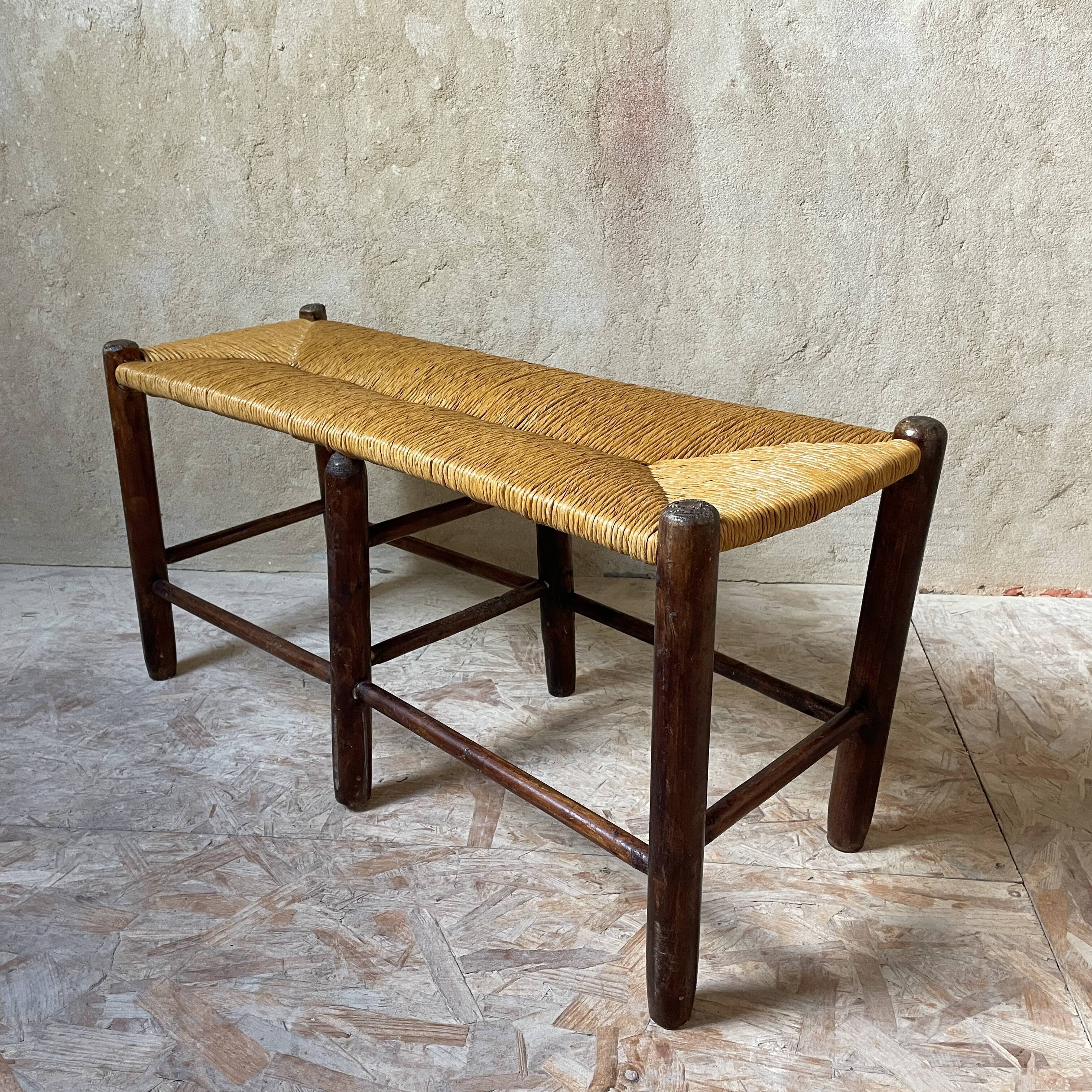 Wooden bench and rustic straw