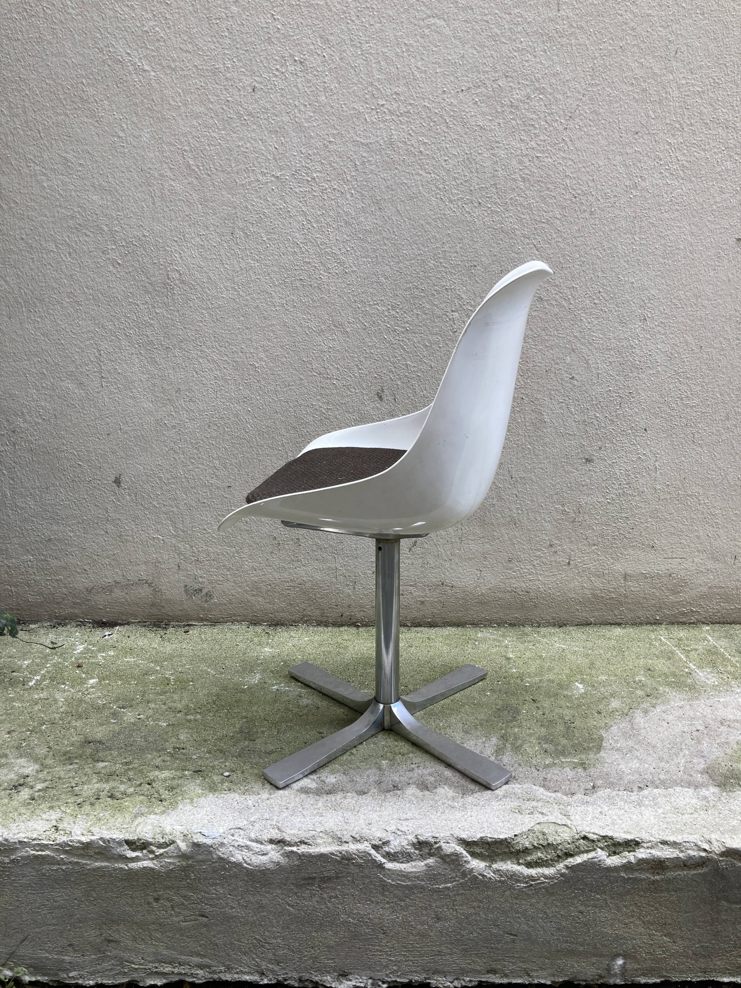 Roche Bobois tulip chair in moulded plastic with a chrome star base.