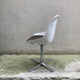 Roche Bobois tulip chair in moulded plastic with a chrome star base.