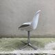 Roche Bobois tulip chair in moulded plastic with a chrome star base.