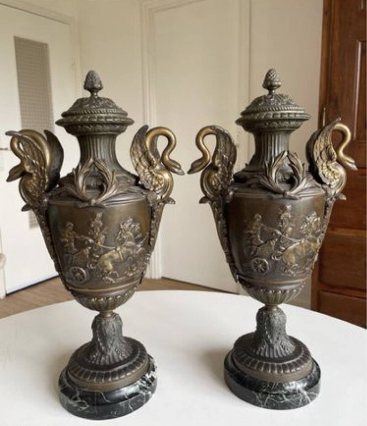According to Émile Louis Picault, sculptor, a pair of large decorative vases.