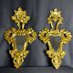 Pair of carved and gilded wooden mirrors, Italian Baroque style, 19th century.