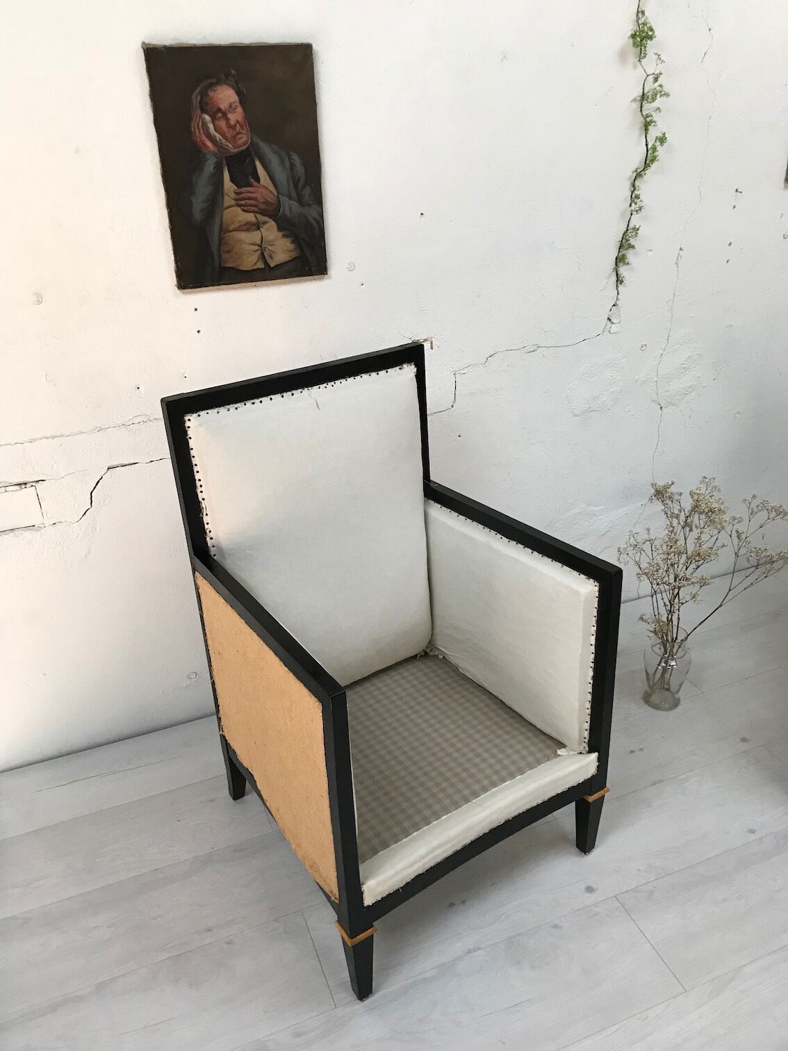 Pair of blackened wooden armchairs