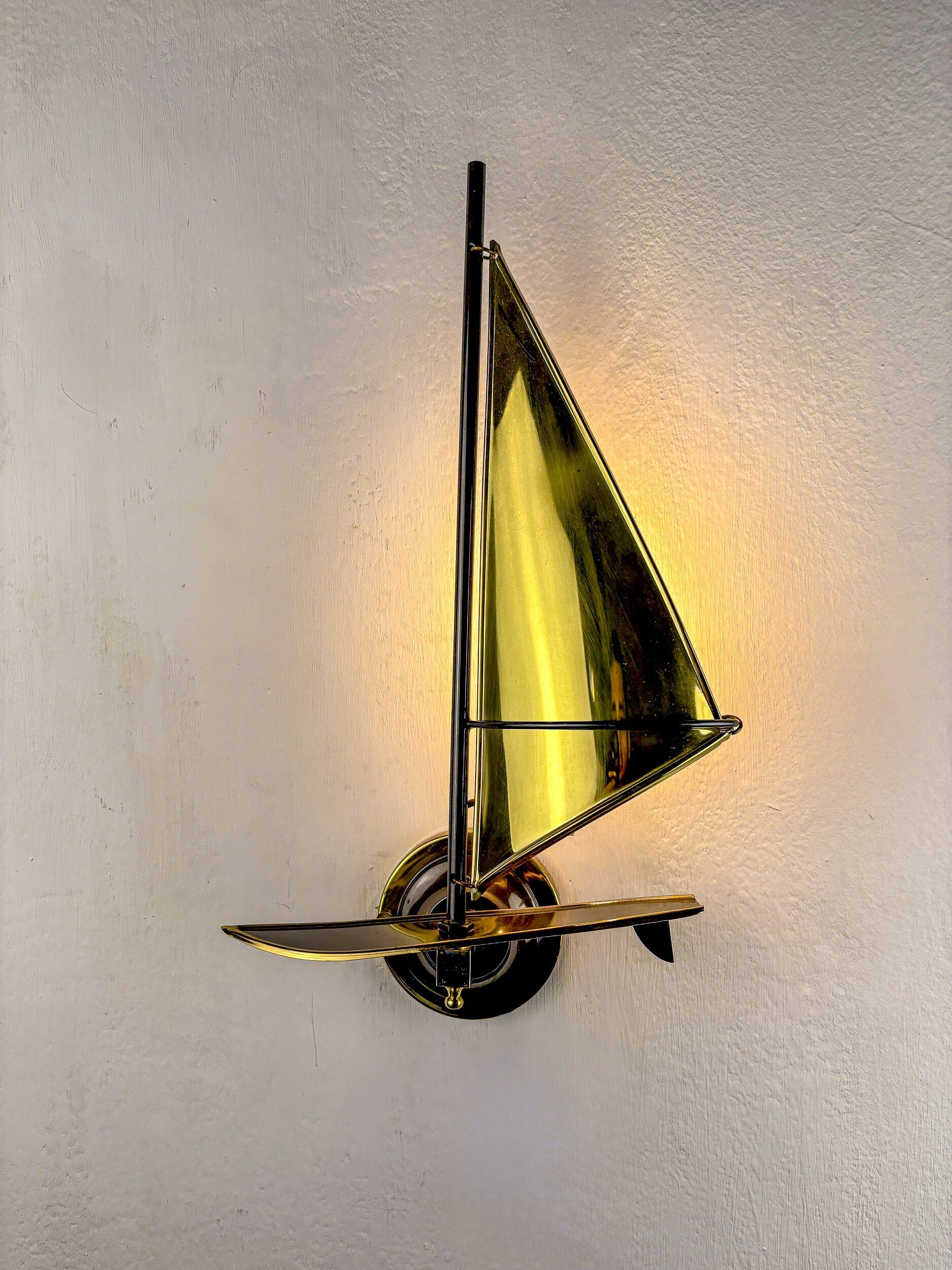 Pair of midcentury brass "sailboats" wall sconces, Italy 1960s