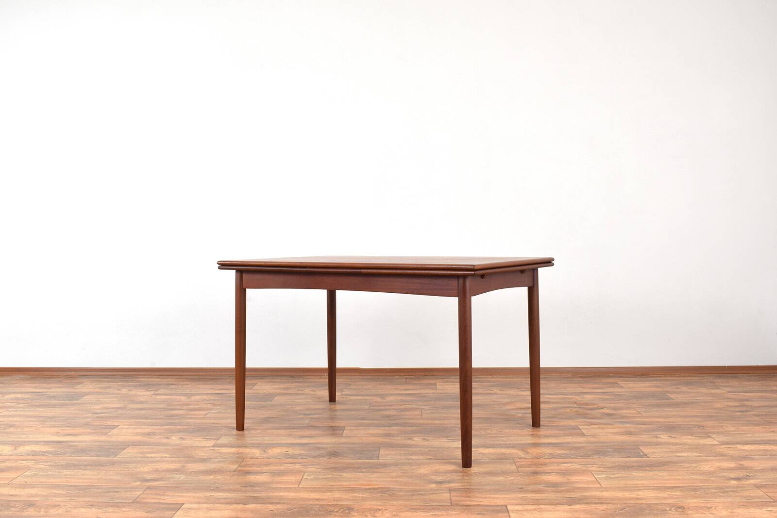 Mid-century Danish teak extendable dining table, 1960s.