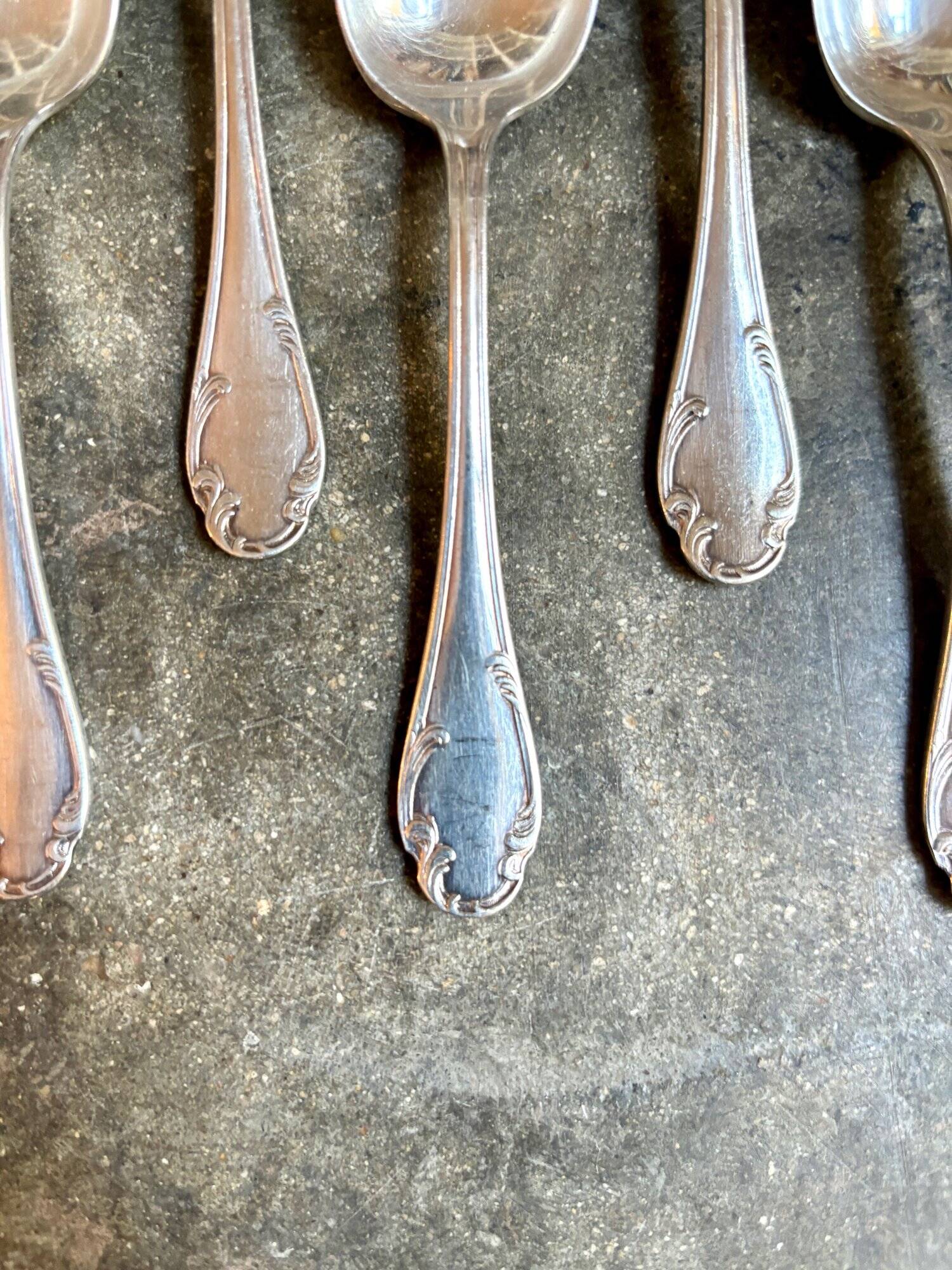 6 small silver metal spoons