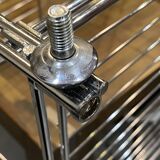 Modular wall bookshelf desk in vintage chrome.