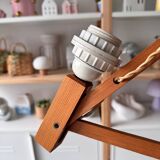 Extendable wooden wall lamp