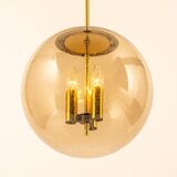 Large Limburg pendant light in brass with smoked glass ball, Germany, 1970s.