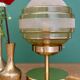 Vintage globe table lamp in frosted yellow and gold glass.